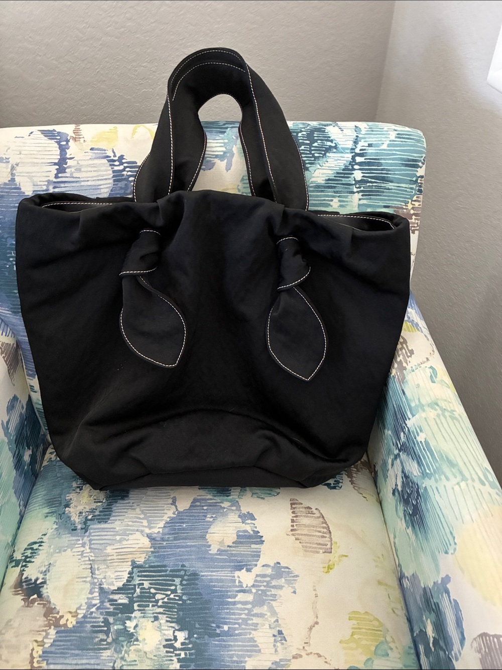 STAUD Black Tote with Knotted Handle and White Topstitch